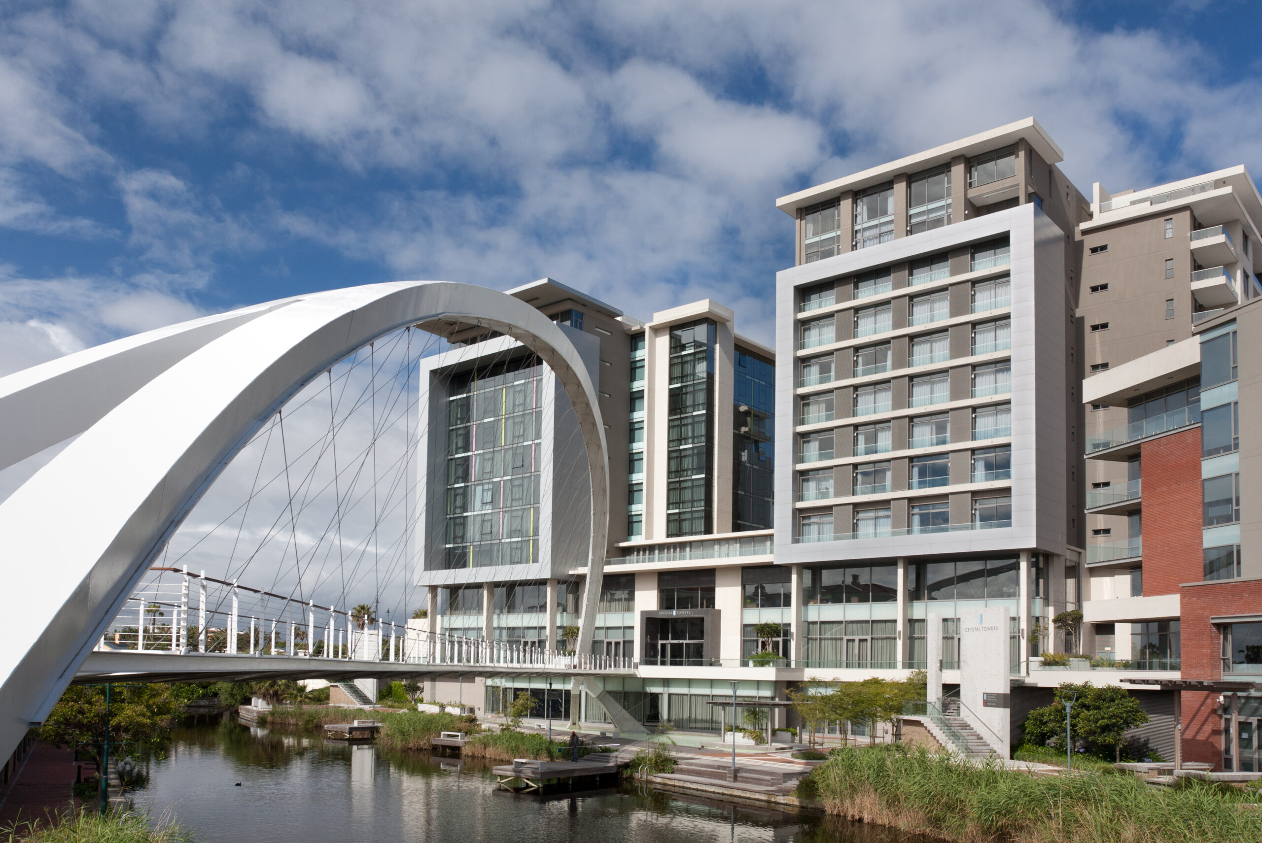 Hotel district with dramatic pedestrian bridge