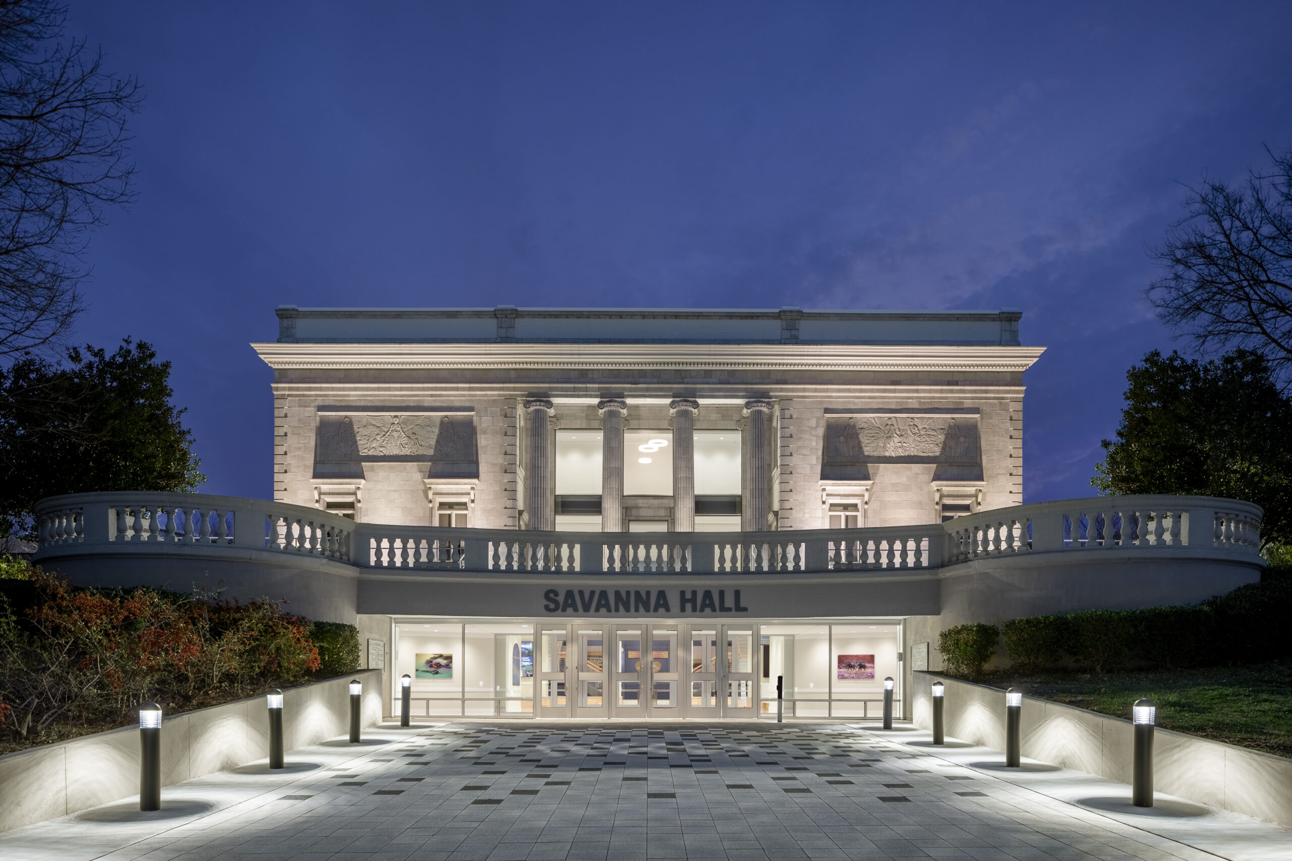 Nighttime photo of Savanna Hall classical architecture at the Zoo Atlanta