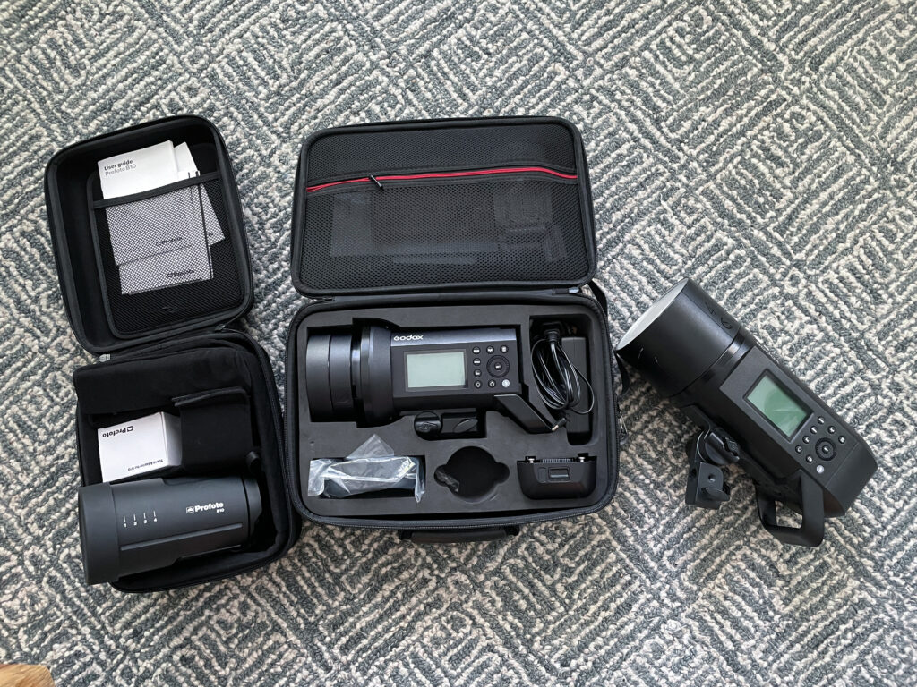 Photo of several photographic lighting strobe units.